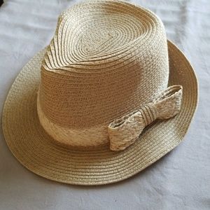Paper braid straw fedora with a bow